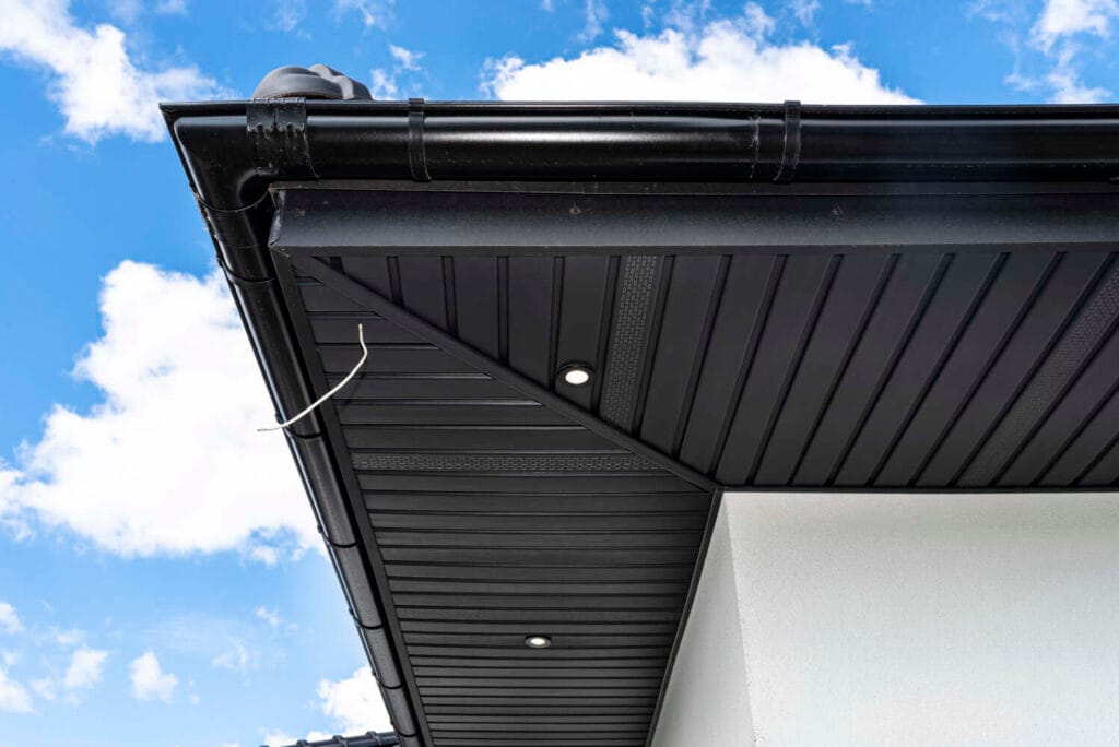 Black Soffit with Recessed LED Spotlights and Black Guttering System